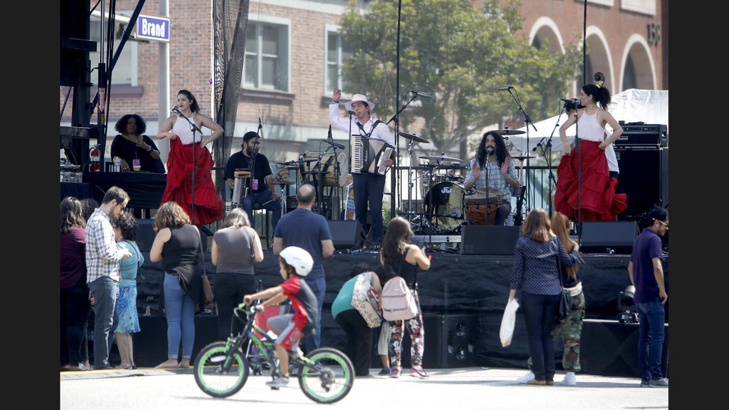 The band El Santo Golpe opens for the crowds at the Open Arts and Music Festival, on Brand Blvd. in Glendale on Saturday, Sept. 16, 2017. The event was sponsored by Glendale Arts and the Downtown Glendale Association.