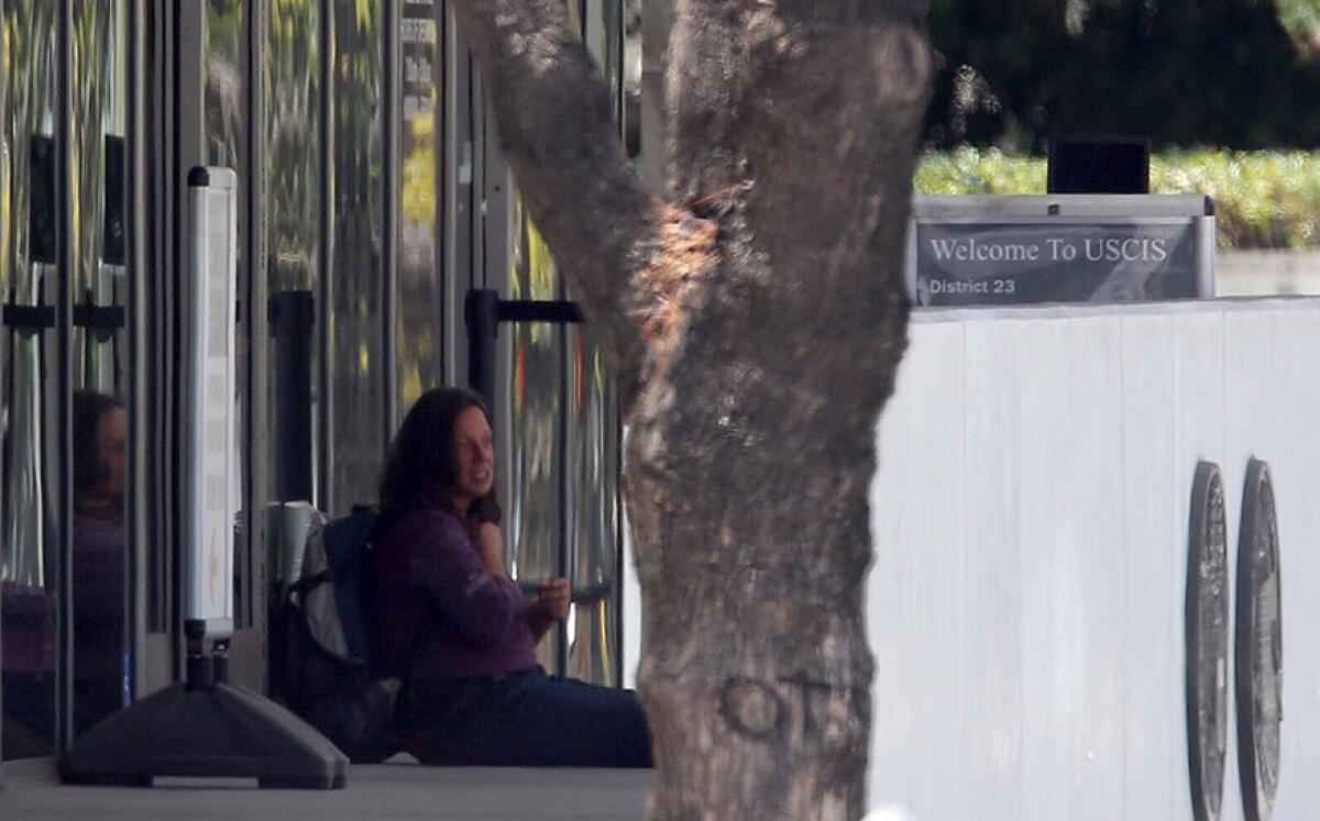 A woman made a bomb threat at the federal building in downtown Los Angeles, police say.