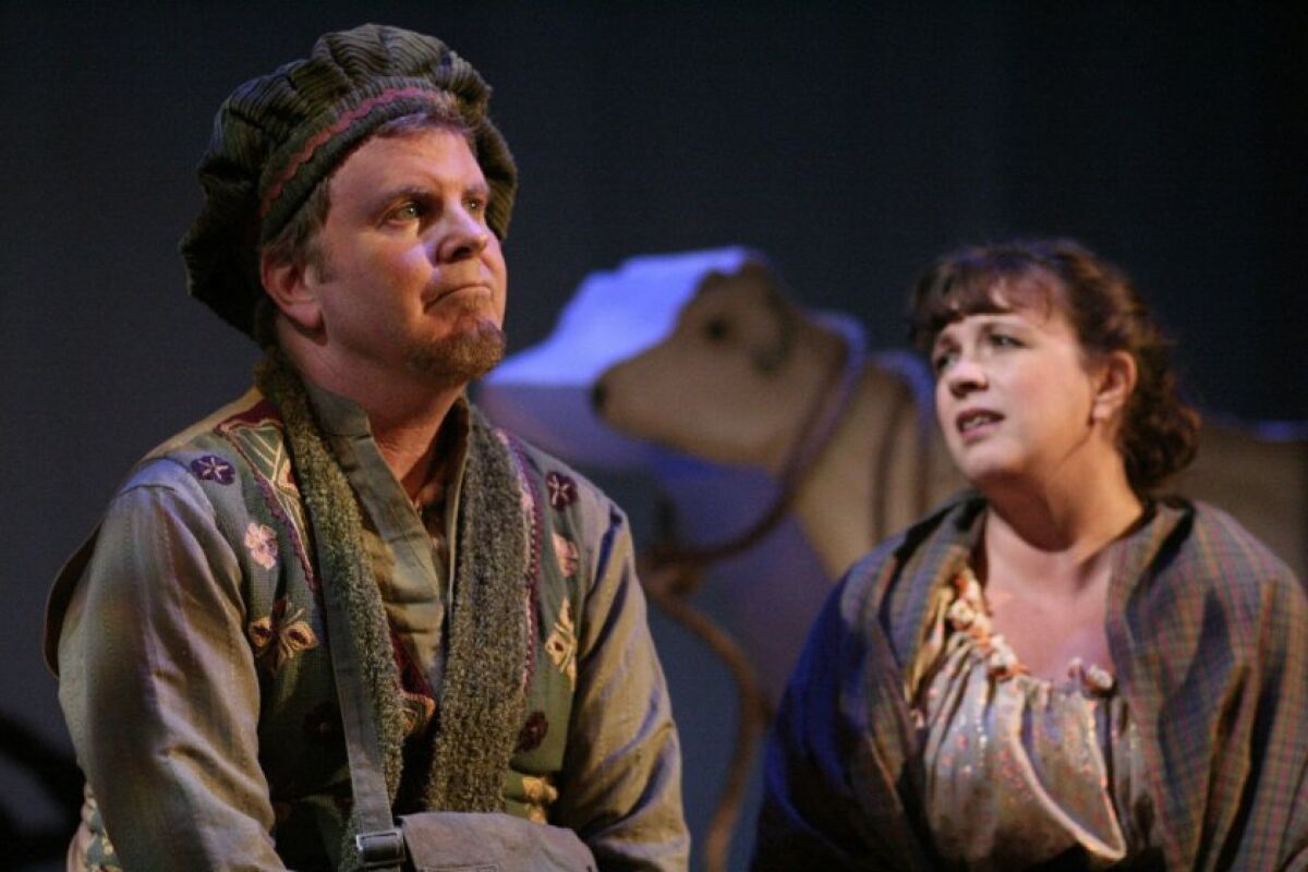 New Village Arts will present the Stephen Sondheim musical "into the Woods" this spring, 10 years after it first produced the musical in 2010 (pictured, with Steven Gunderson and Melissa Fernandes as the Baker and his wife.