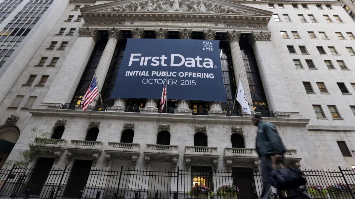 Fiserv is buying First Data in a $22-billion deal, creating a giant player in the payment-processing and financial technology sector.