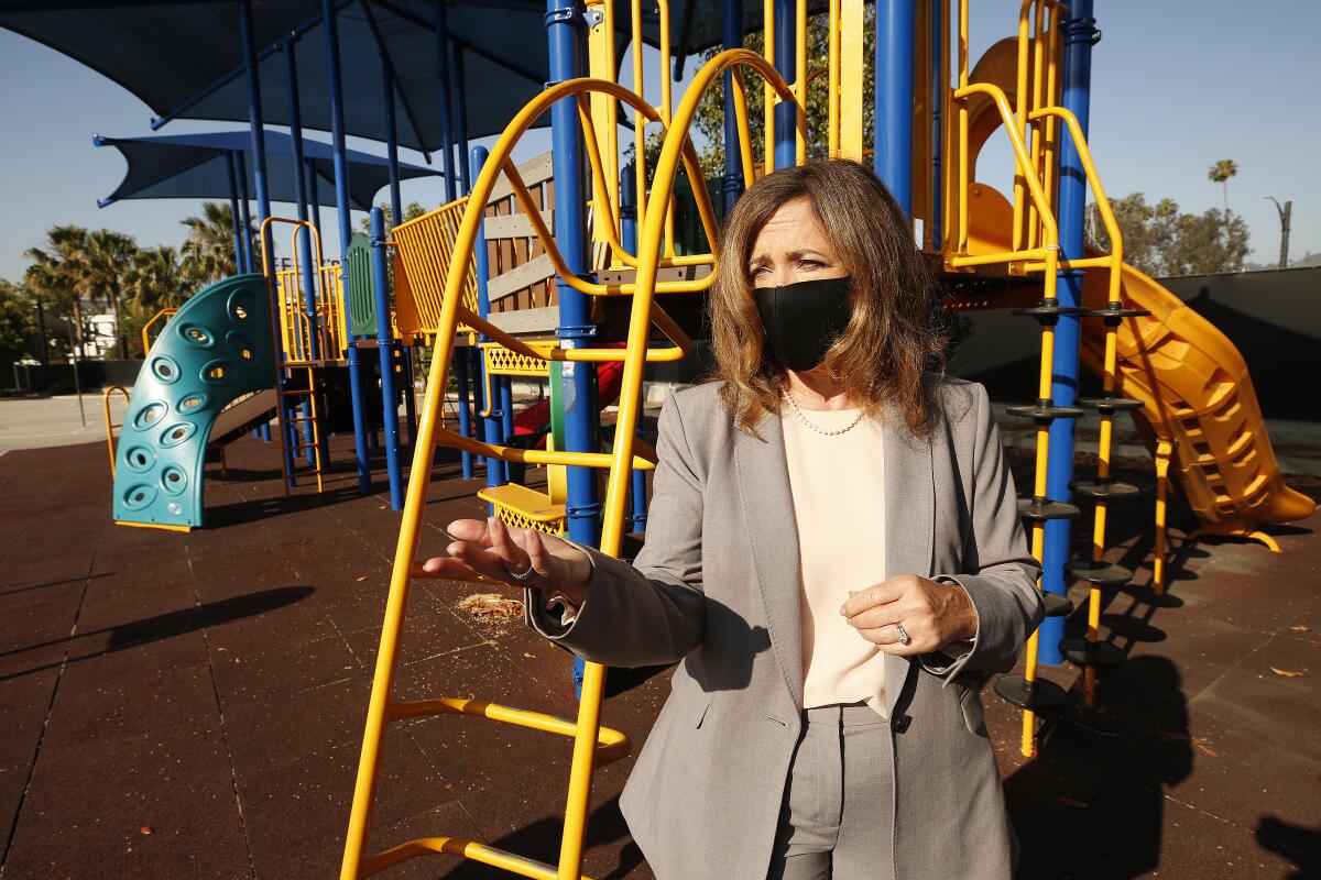 L.A. County Office of Education Supt. Debra Duardo stands at a play structure at Cerritos Elementary in Glendale. 