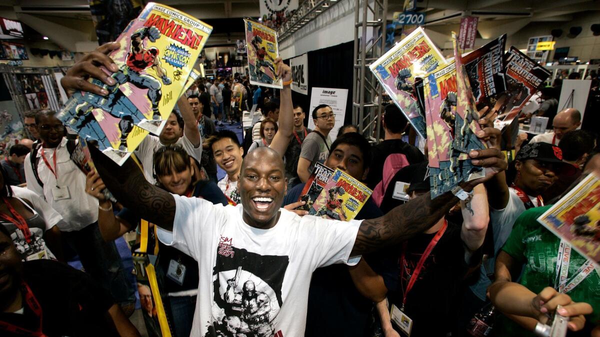 When Hollywood star power and comics come together: "Fast and Furious" actor Tyrese Gibson introducing his comic book "Mayhem" to a friendly crowd at Comic?Con International 2009.