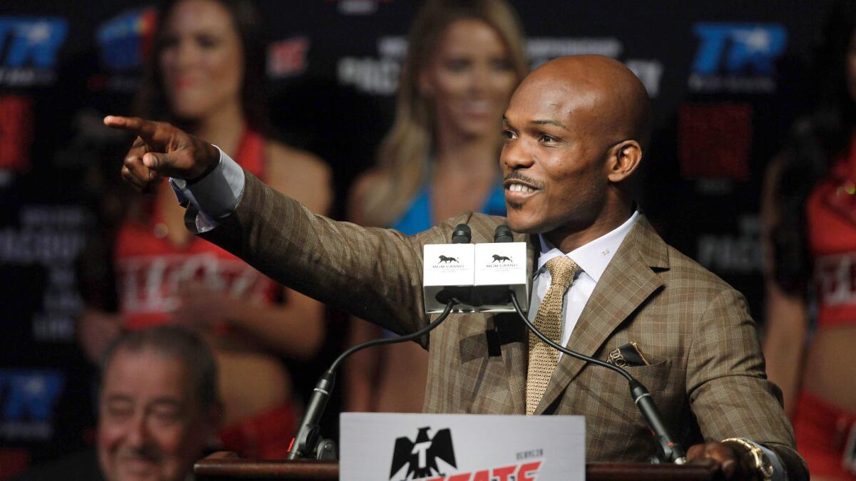 Timothy Bradley Jr. points out his grandmother during a news conference at the MGM Grand on April 6.