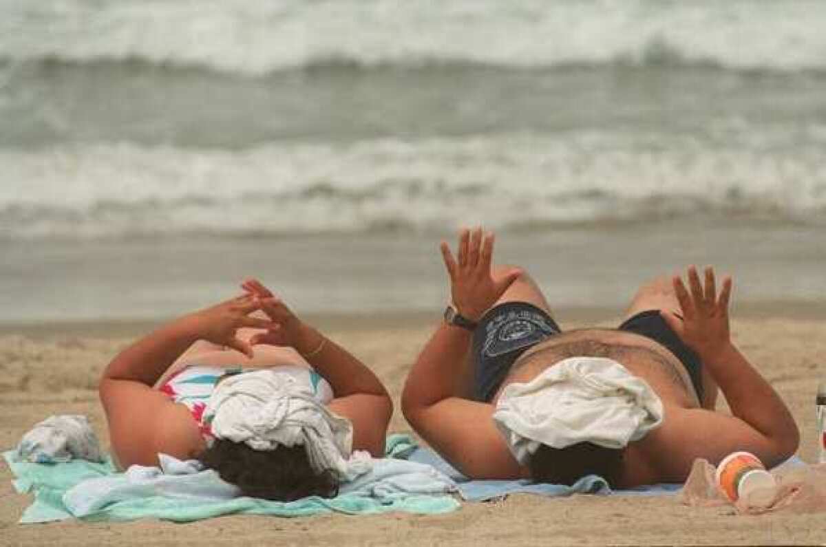 if these two don't cover up soon, they'll pay for it later with a nasty sunburn. A new study reveals just what happens inside the skin when we fry ourselves on the beach.