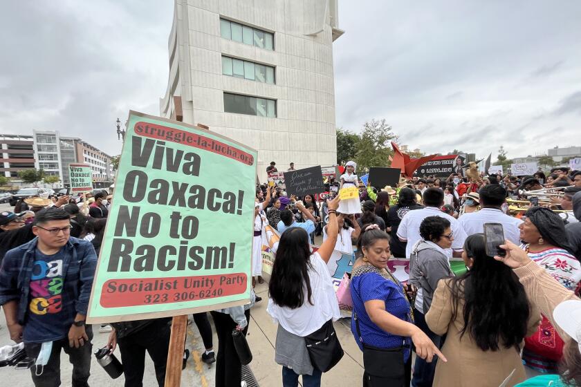 Hundreds of members of the Oaxacan community, along with prominent leaders from indigenous communities across California, participate in a March for Justice through the streets of downtown Los Angeles towards City Hall on October 14, 2022.