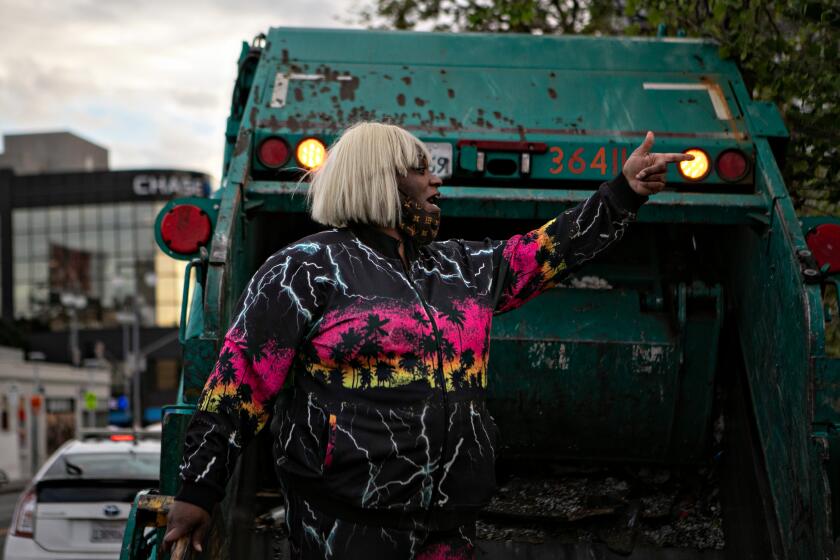  Ms. Italy protests inside of a dump truck.