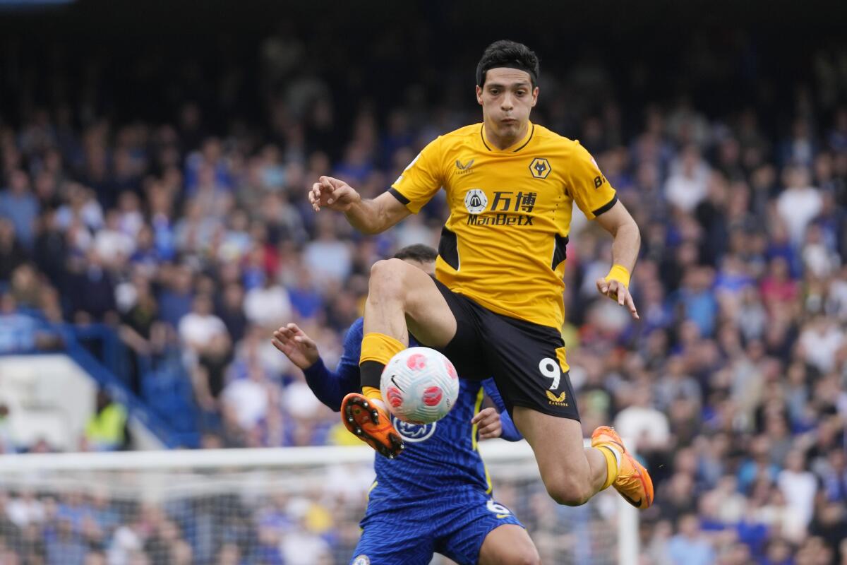 FILE - Wolverhampton Wanderers' Raul Jimenez controls the ball during the English Premier League soccer match between Chelsea and Wolverhampton at Stamford Bridge stadium, in London, on May 7, 2022. Jimenez hasn't trained this week and will not be ready to play against Manchester City, Wolves manager Bruno Lage said Friday Sept. 16, 2022. (AP Photo/Frank Augstein, File)