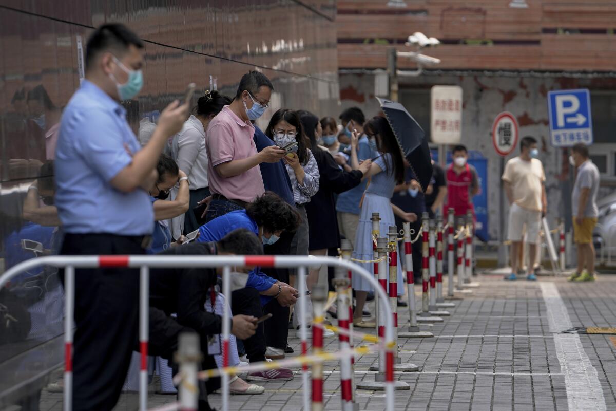 People queuing for coronavirus testing in Beijing