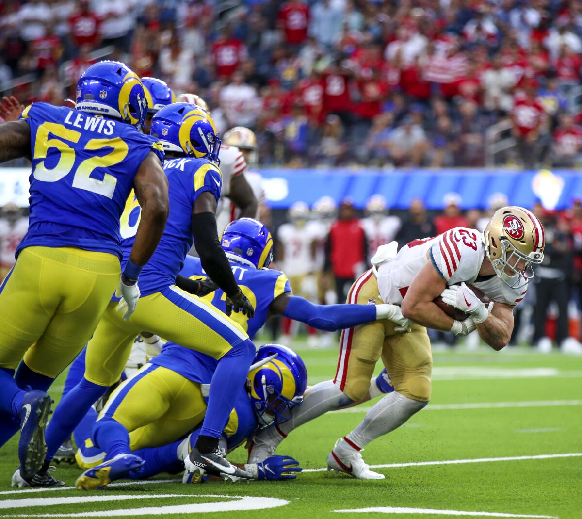 San Francisco running back Christian McCaffrey (23) breaks away from the Rams defense in the fourth quarter.
