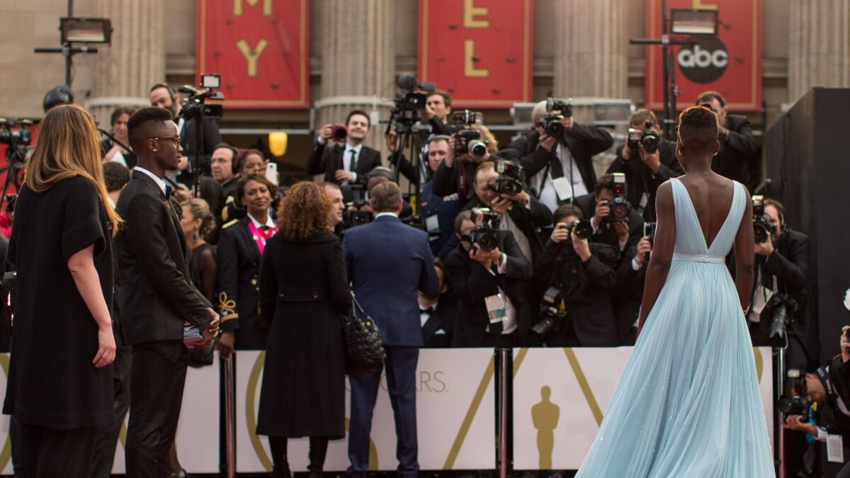 Lupita Nyong'o attends the Oscars on March 2, 2014, in Hollywood.