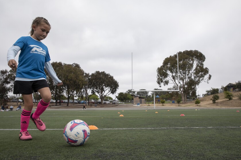 Phoebe Rees, 8, during in soccer practice in National City.