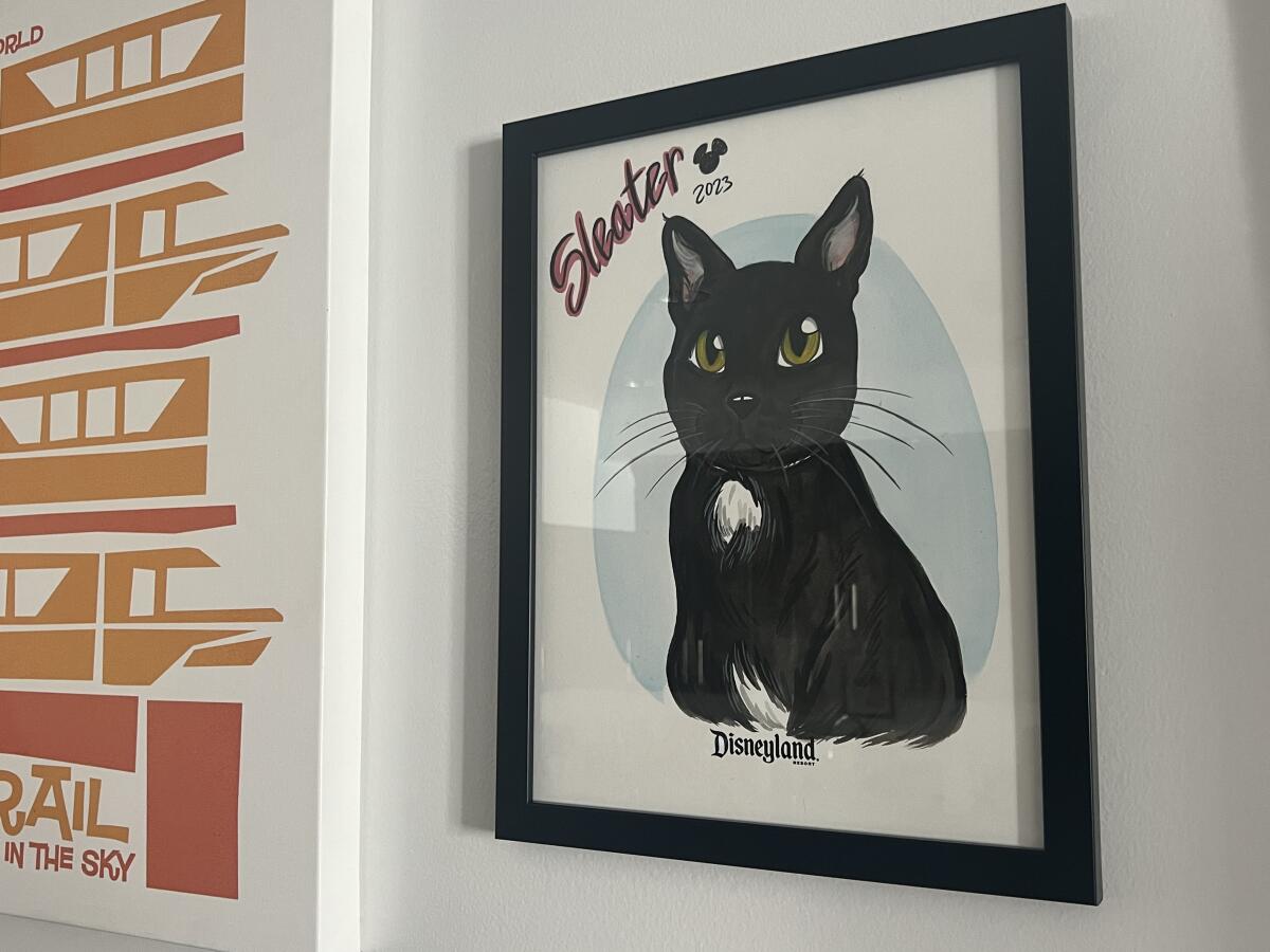 A portrait of the author's cat, Sleater, painted by one of Disneyland's caricature artists.