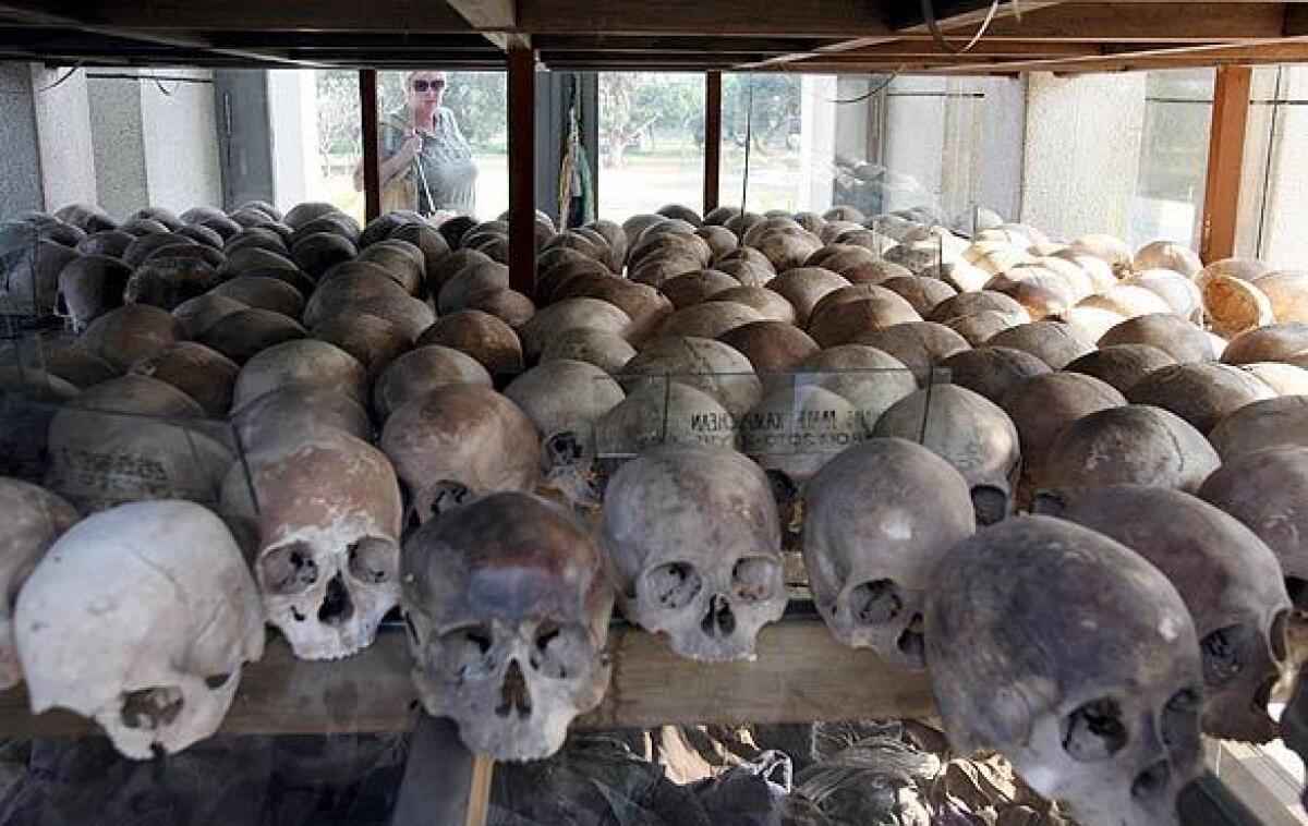 Skulls of Khmer Rouge victims on display at Choeung Ek Genocidal Center outside Phnom Penh, Cambodia.
