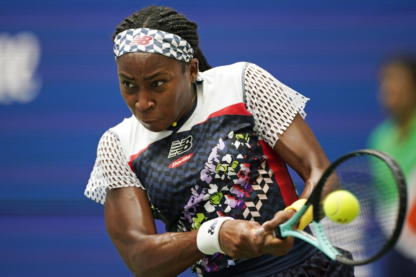 Coco Gauff hits a return during her win over Shuai Zhang on Sunday.