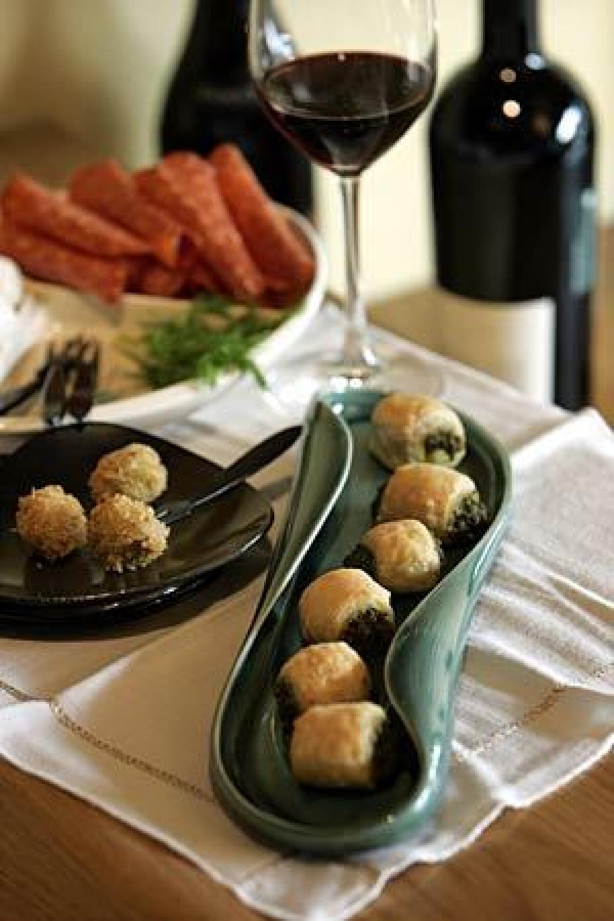 Aperitivo is all about delicious bites that are easy to fix and go well with drinks. Tuck hazelnut pesto into puff pastry; stuff olives with soppressata and Fontina, then bread and fry them; turn creamy risotto into crisp little squares.