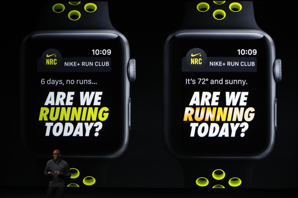 Nike President Trevor Edwards discusses a smartwatch created in partnership with Apple during an event in San Francisco on Wednesday.
