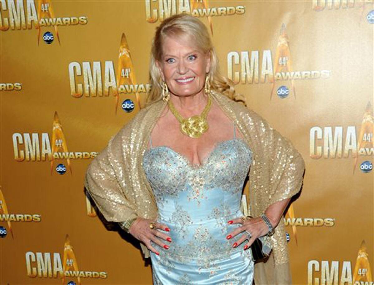 FILE - In this Nov. 10, 2010 file photo, Lynn Anderson attends the 44th Annual Country Music Awards in Nashville, Tenn. Anderson, whose strong, husky voice carried her to the top of the country and pop charts with "(I Never Promised You a) Rose Garden," died Thursday, July 30, 2015 at Vanderbilt Medical Center in Nashville, Tenn. She was 67. (AP Photo/Evan Agostini, File)