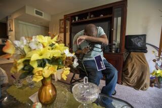 Arcadia, CA - October 12: Roland Coleman, 72, in his livingroom on Wednesday, Oct. 12, 2022, in Arcadia, CA. Yesterday he said was a great day. Today his blood pressure was very low and he was feeling out of sorts. Coleman has been hoping to get a kidney transplant. But to have a shot at a donated organ, he needs to get onto the waitlist. Coleman was referred to Keck Medical Center two years ago to start being evaluated as a possible candidate for transplant but has not been put on the waitlist so far. His situation underscores the challenges that kidney patients can face in getting waitlisted - a step in the transplant process that is less scrutinized than what happens to patients once they get onto the list. (Francine Orr / Los Angeles Times)