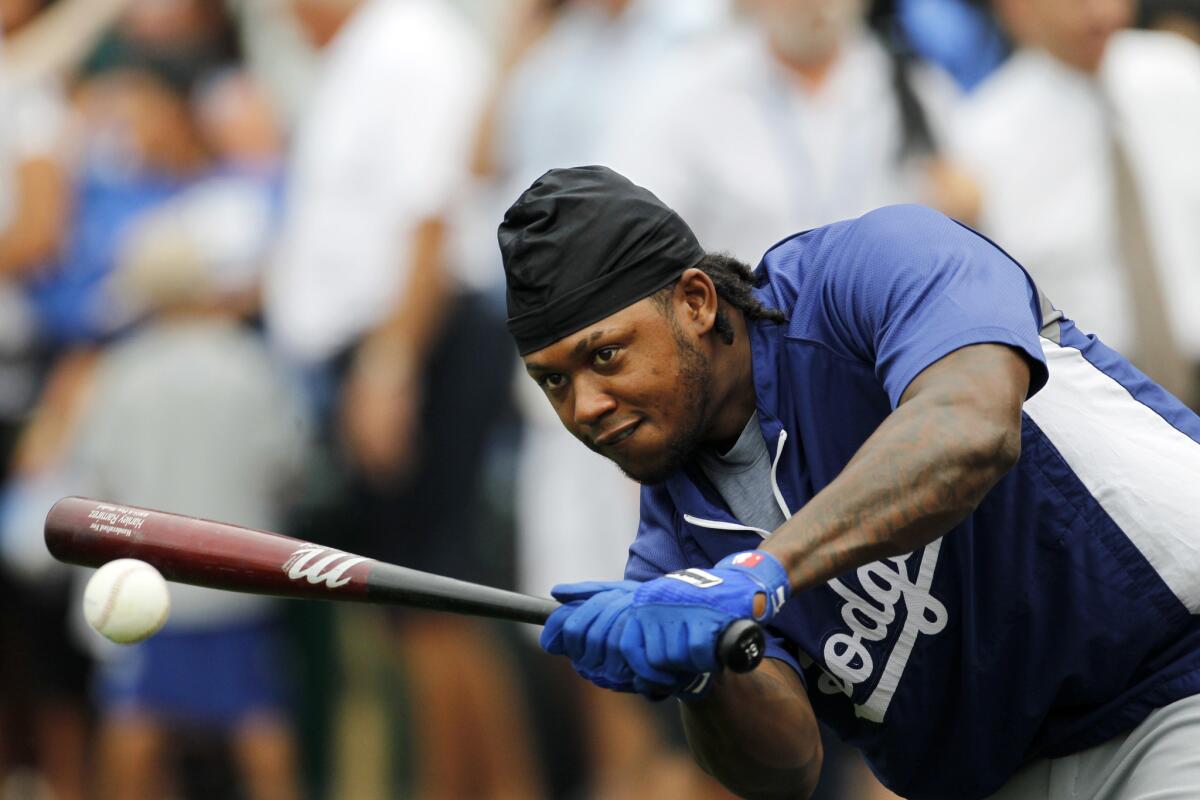 Los Angeles Dodgers' Hanley Ramirez hits the ball while waiting his turn at batting practice before a game against Kansas City Royals on June 23.