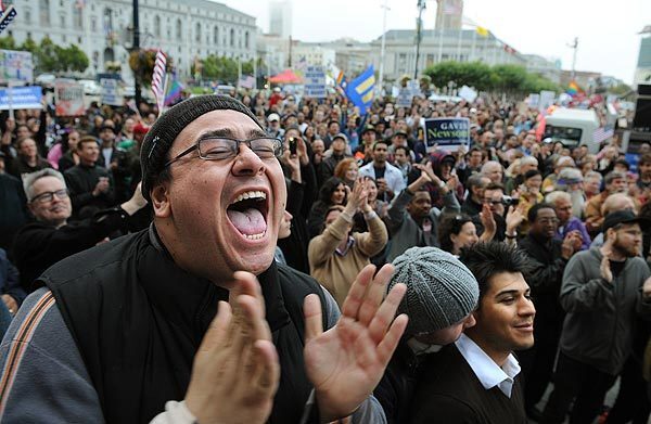 Steve Proo cheers during a rally outside City Hall in San Francisco after a judge overturned the same-sex marriage ban.