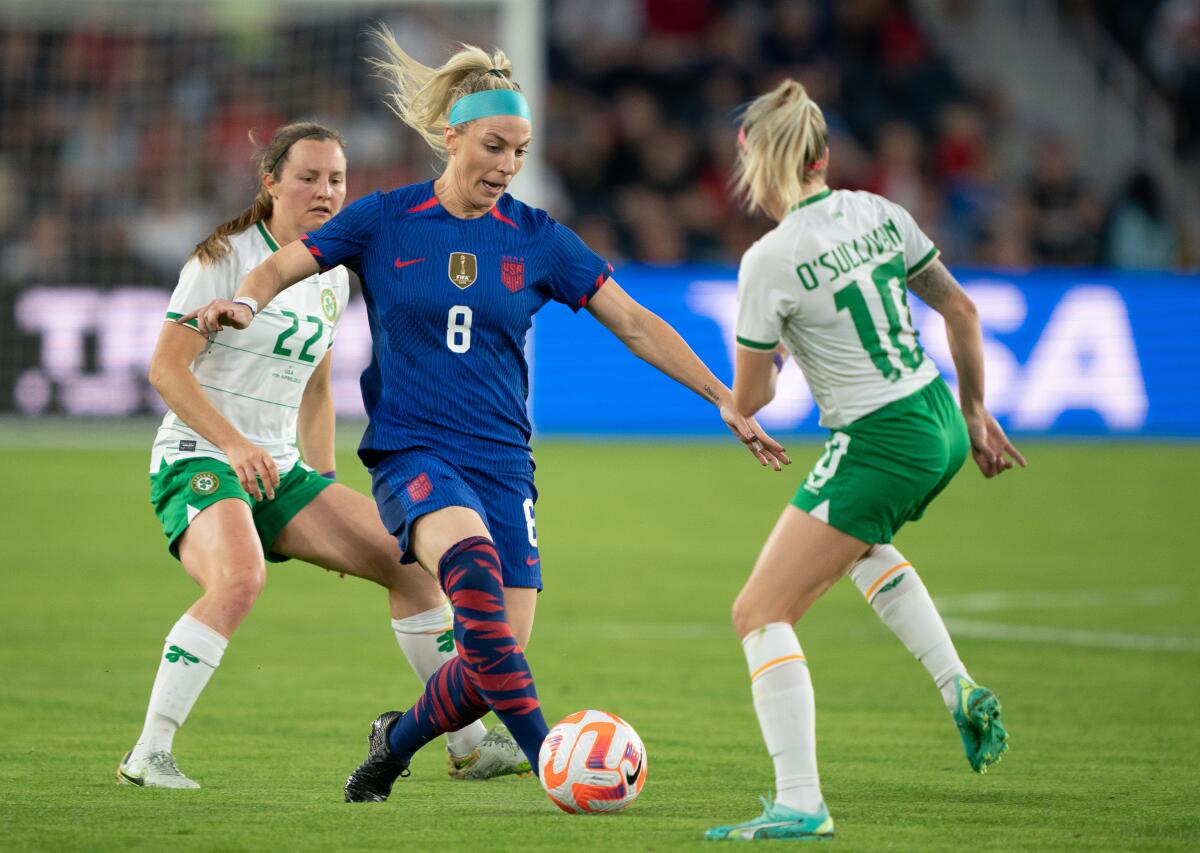 Julie Ertz, center, controls the ball during an international friendly against Ireland on April 11 in St. Louis.