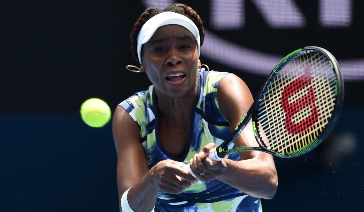 Venus Williams plays a backhand return during her women's singles match against Johanna Konta on Tuesday.
