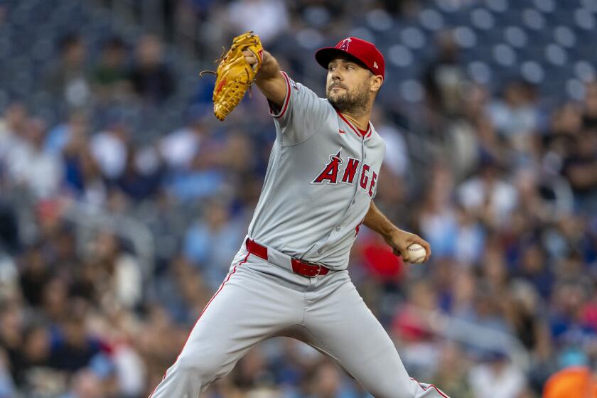 TORONTO, CANADA - AUGUST 22: Brock Burke #46 of the Los Angeles Angels pitches.