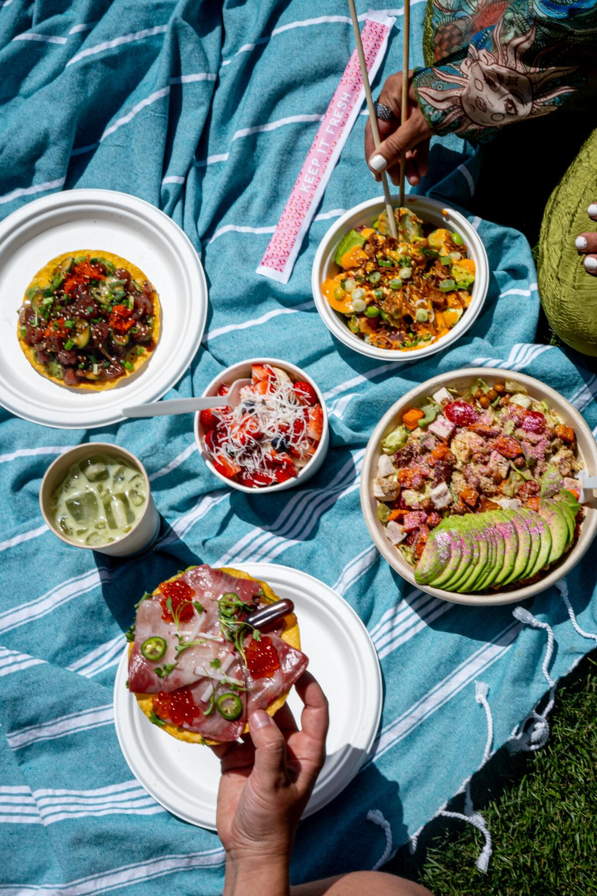 A dispersed with acai bowls, salads and poke bowls