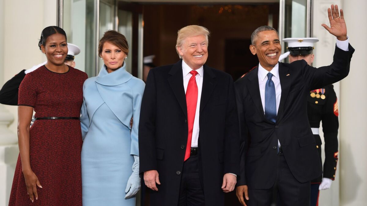 First Lady Michelle Obama, Melania Trump, President-elect Donald Trump and President Obama meet at Trump's inauguration.