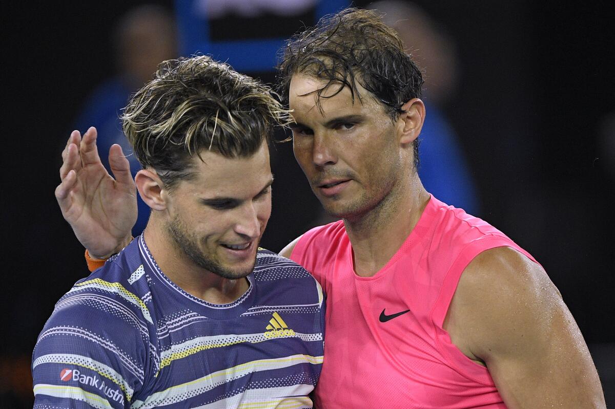 Austria's Dominic Thiem, left, is congratulated Jan. 29 by Spain's Rafael Nadal after winning their quarterfinal match at the Australian Open tennis championship in Melbourne. 