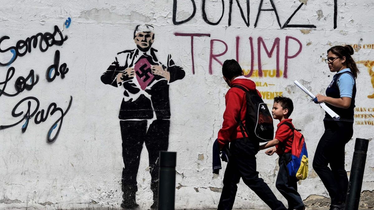 An anti-President Trump mural in Caracas.