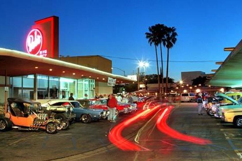 In the beginning, drive-in restaurants offered all sorts of food - including chili, tamales and spaghetti - served by carhops. Eventually, the menu turned to hamburgers. Bob's Big Boy, like this one in Burbank, invented the double-decker.