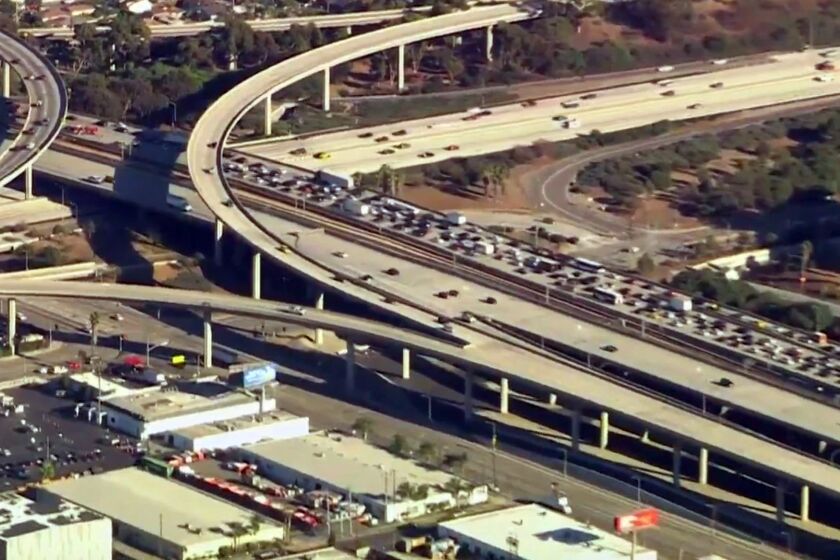 Traffic on the eastbound 105 Freeway is backed up due to a multi-car collision Friday. Eight people were transported to the hospital.