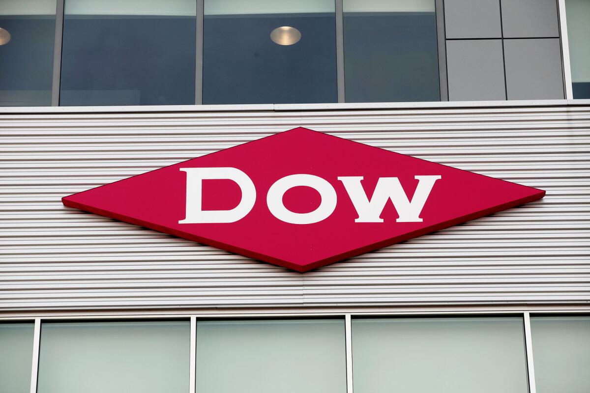 The Dow Chemical logo on a building in downtown Midland, Mich.