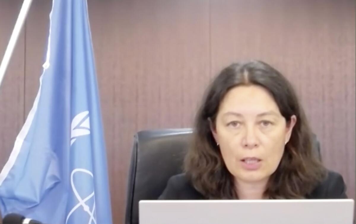 In this image made from video, head of the International Atomic Energy Agency Lydie Evrad, speaks to media via video conference concerning the Fukushima Daiichi nuclear power plant, damaged in the massive earthquake and tsunami in 2011, Thursday, Sept. 9, 2021. The three-member team led by Evrard, is in Japan for a five-day visit for a preliminary talks and visit to the nuclear power plant to prepare for the IAEA's multi-year monitoring and review of the planned water discharge, which is expected to take decades. (Foreign Press Center Japan via AP)