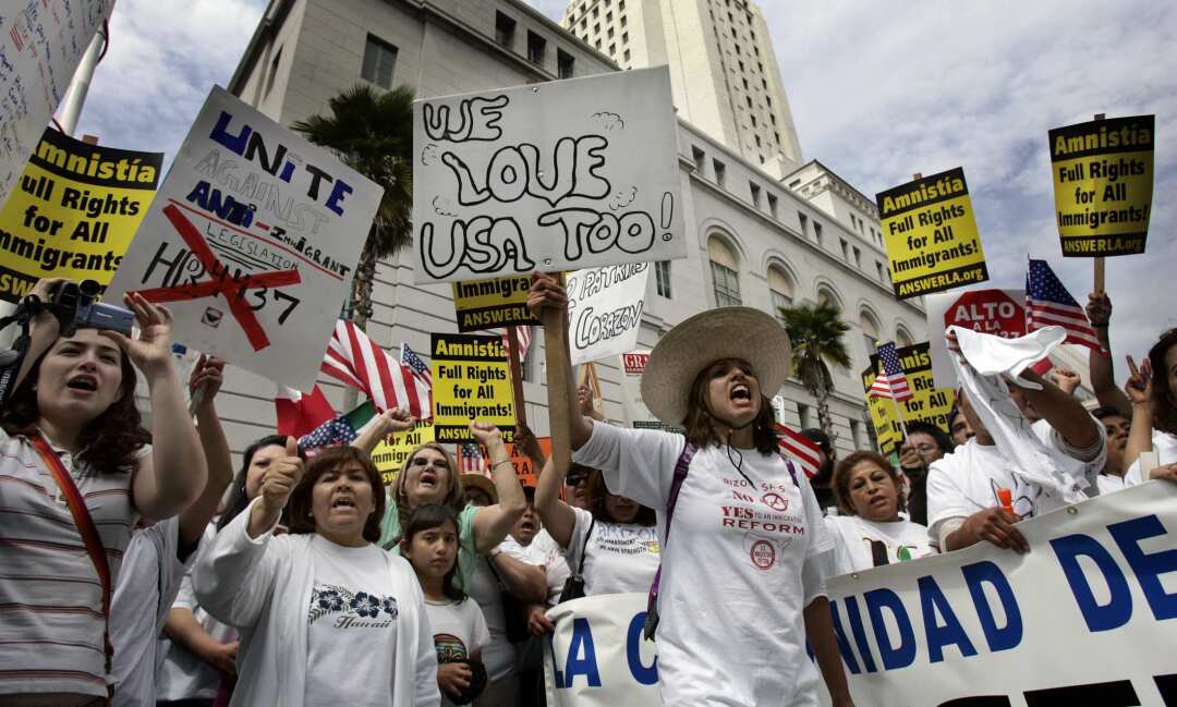 Marchers  carry signs and chant in downtown L.A. 