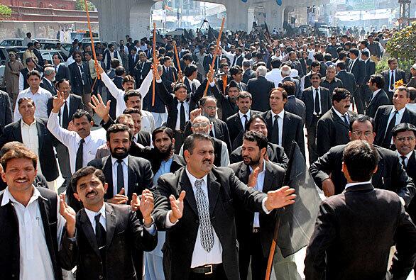 Pakistani lawyers protest the arrests of their colleagues in Multan. Opposition activists and lawyers across the country plan to take part in a long march to Islamabad, the Pakistani capital.