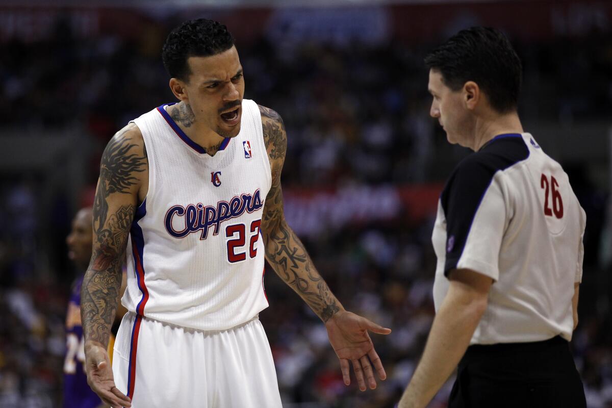 Then-Clippers forward Matt Barnes protests a foul during the game against the Lakers in 2013.