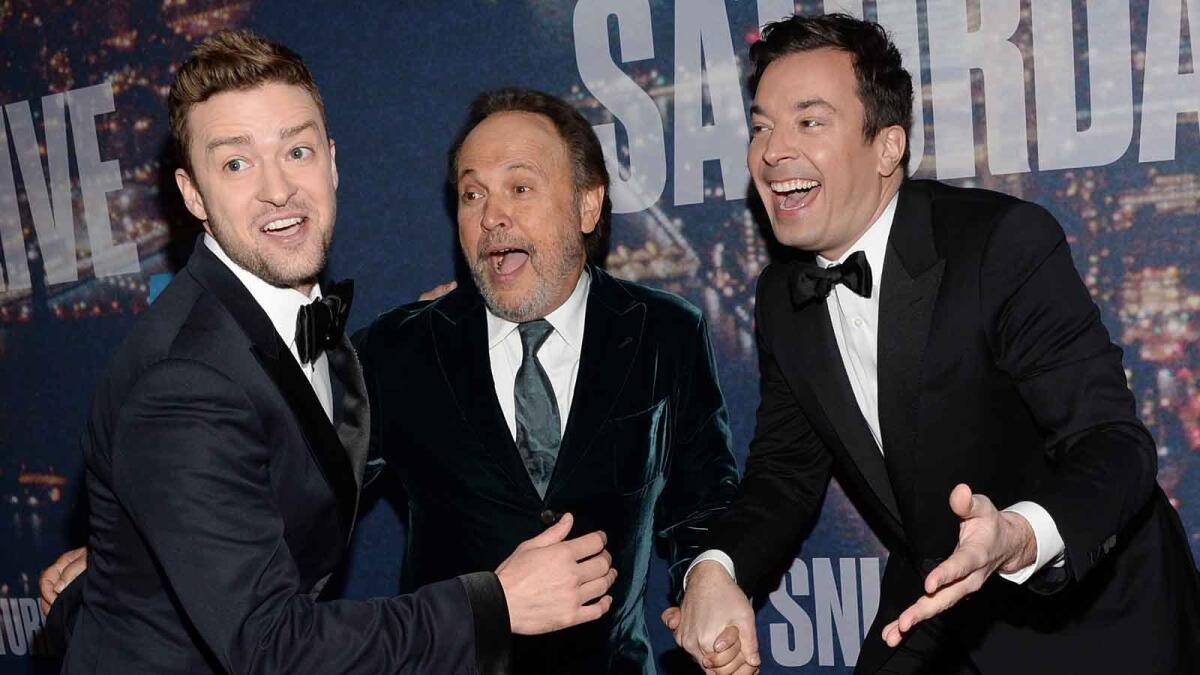 Justin Timberlake, left, Billy Crystal and Jimmy Fallon arrive at the "Saturday Night Live 40th Anniversary Special" at Rockefeller Plaza in New York.