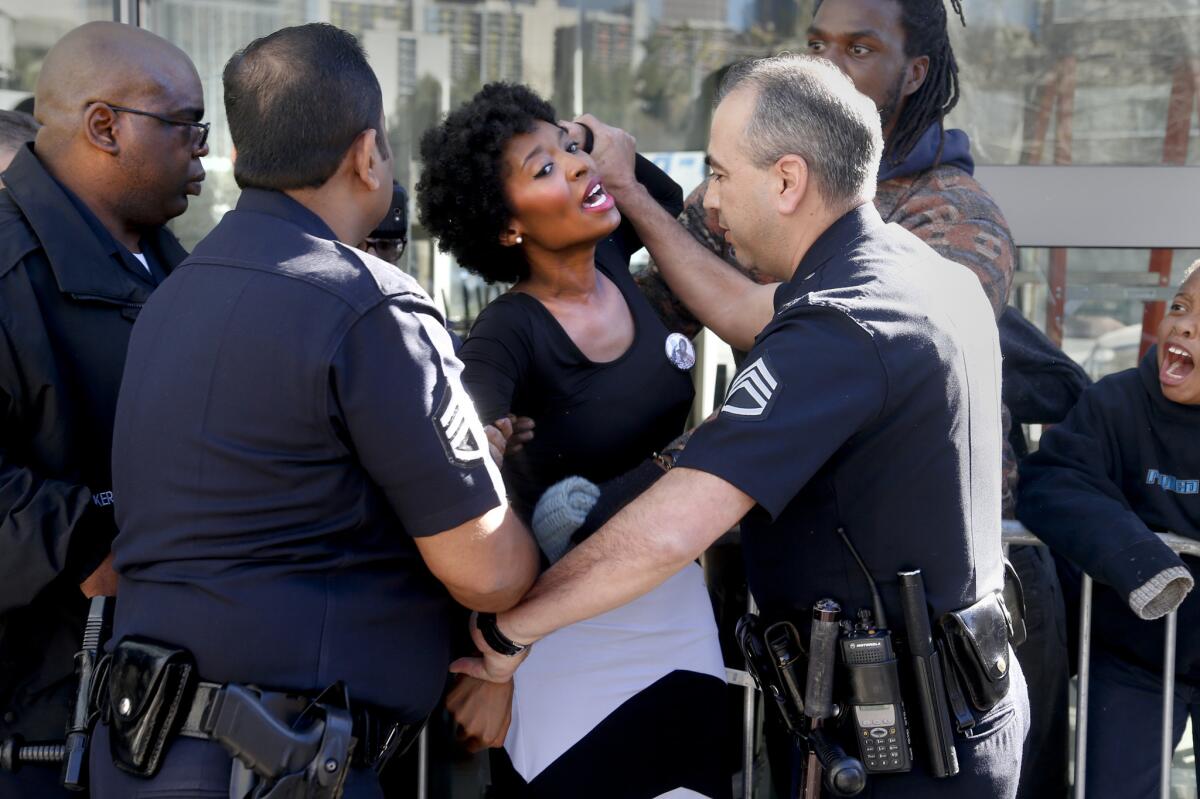 Sha Dixon, organizer for Black Lives Matter Los Angeles, is arrested by Los Angeles police Jan. 5.