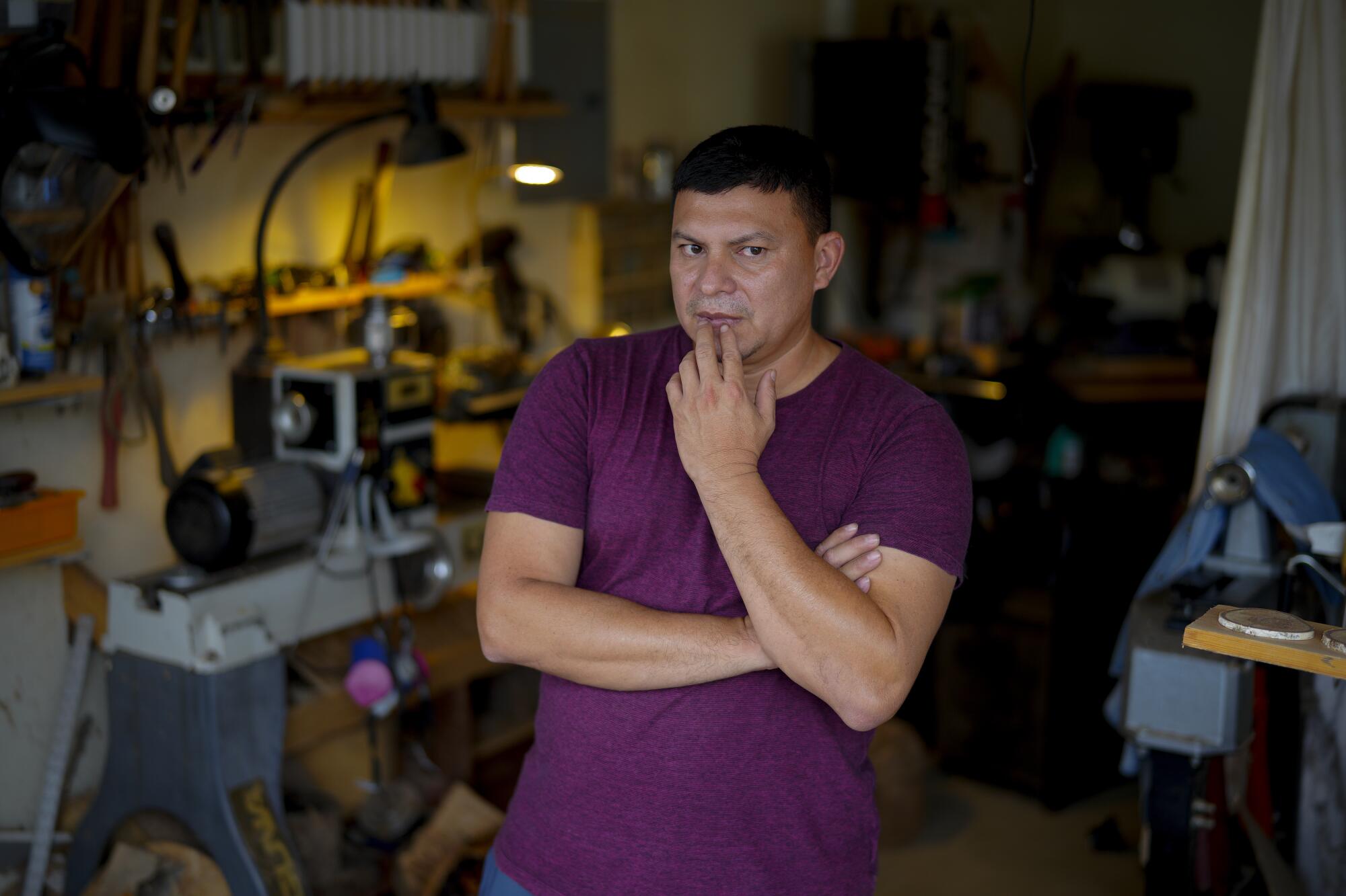  Ernesto Aquino at his wood shop in the garage of his home in Fallbrook.