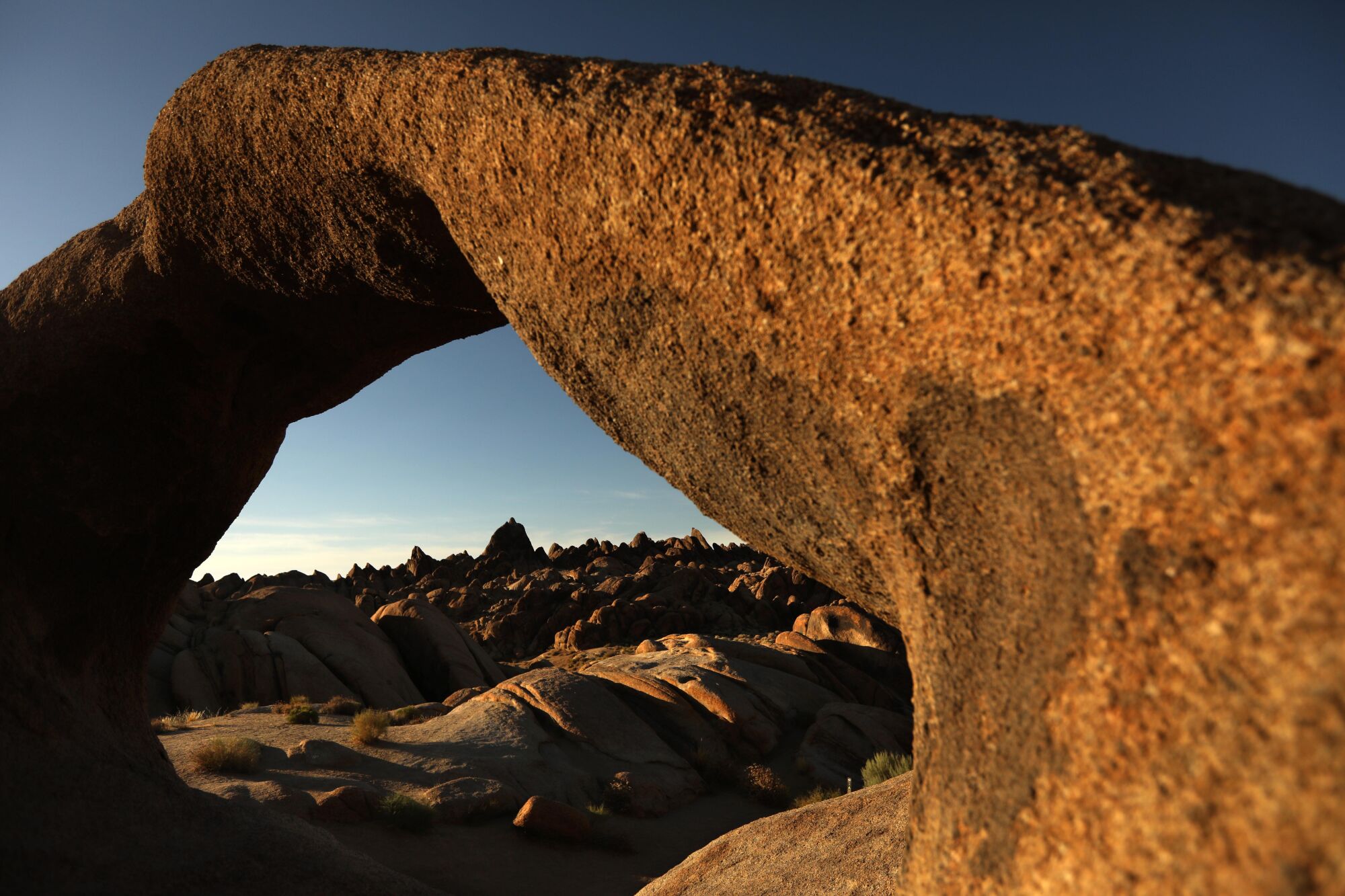 The Mobius Arch frames Alabama Hills National Scenic Area west of Lone Pine.