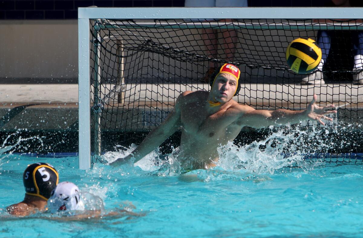 St. Francis High goalkeeper Cole Marston makes a save in CIF Southern Section Division V quarterfinal match against Burroughs at Sherman Oaks Notre Dame High.