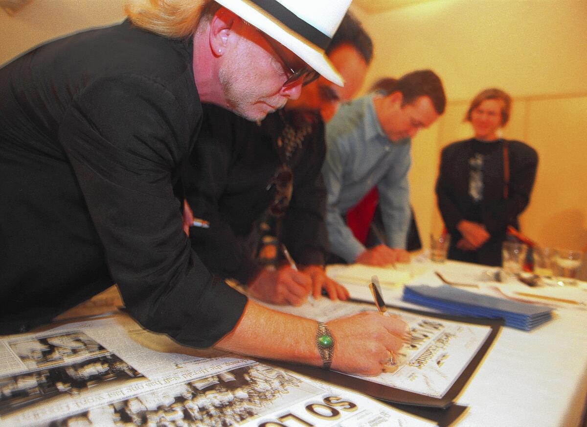 Larry Burrough takes part in a recent reunion of Los Angeles Herald Examiner staff members in Los Angeles.