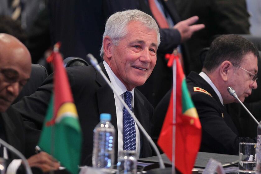 Secretary of Defense Chuck Hagel attends a session of the Conference of Defense Ministers of the Americas in Arequipa, Peru, on Monday.
