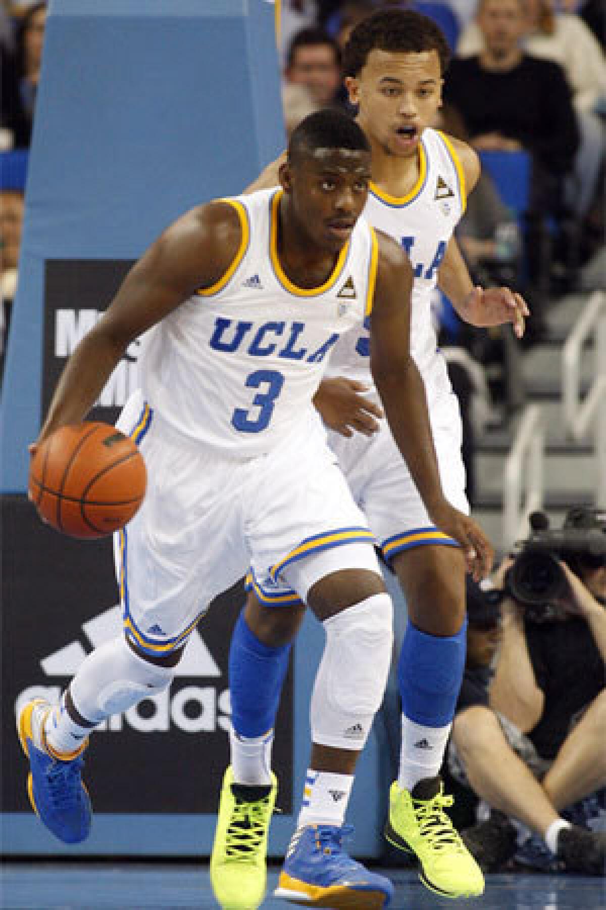 UCLA guards Jordan Adams, left, and Kyle Anderson.