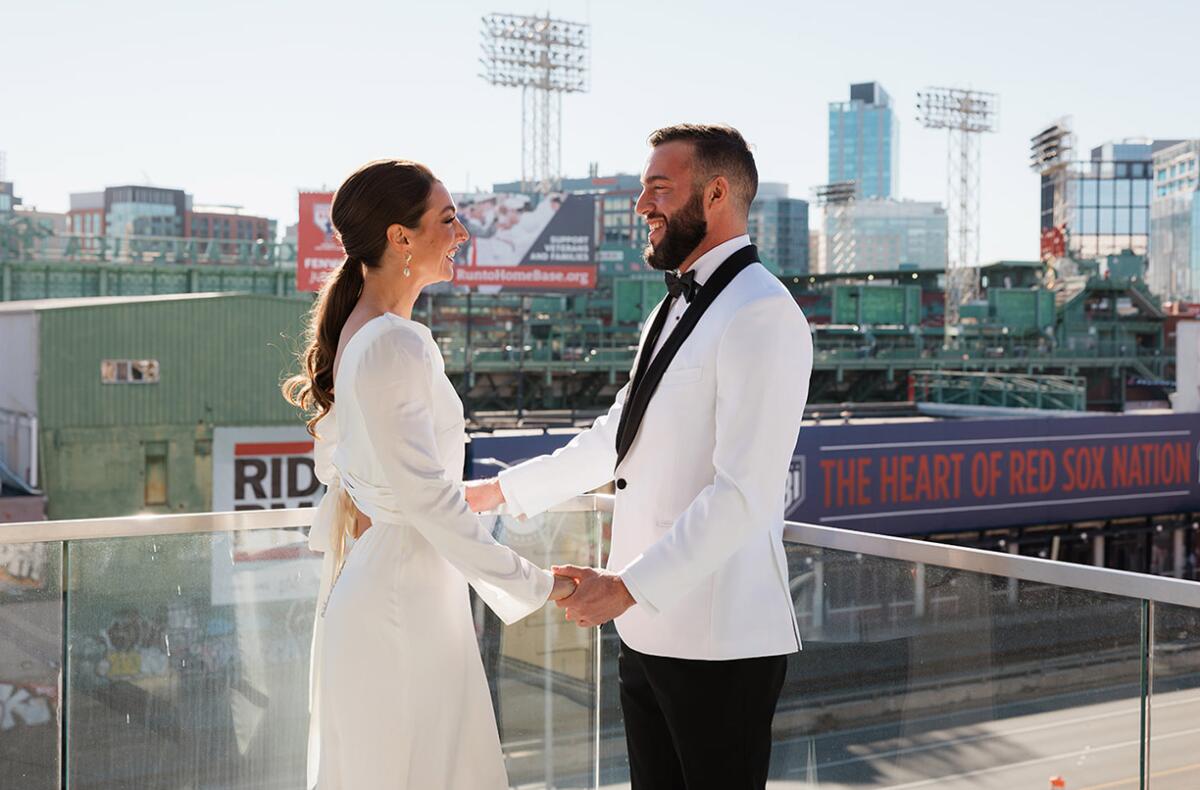 A wedding ceremony overlooking Fenway Park at the House of Blues in Boston.