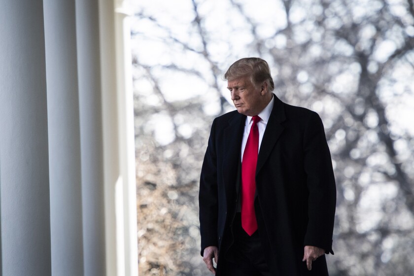 President Donald Trump walks out to the Rose Garden at the White House on Jan. 25, 2019.