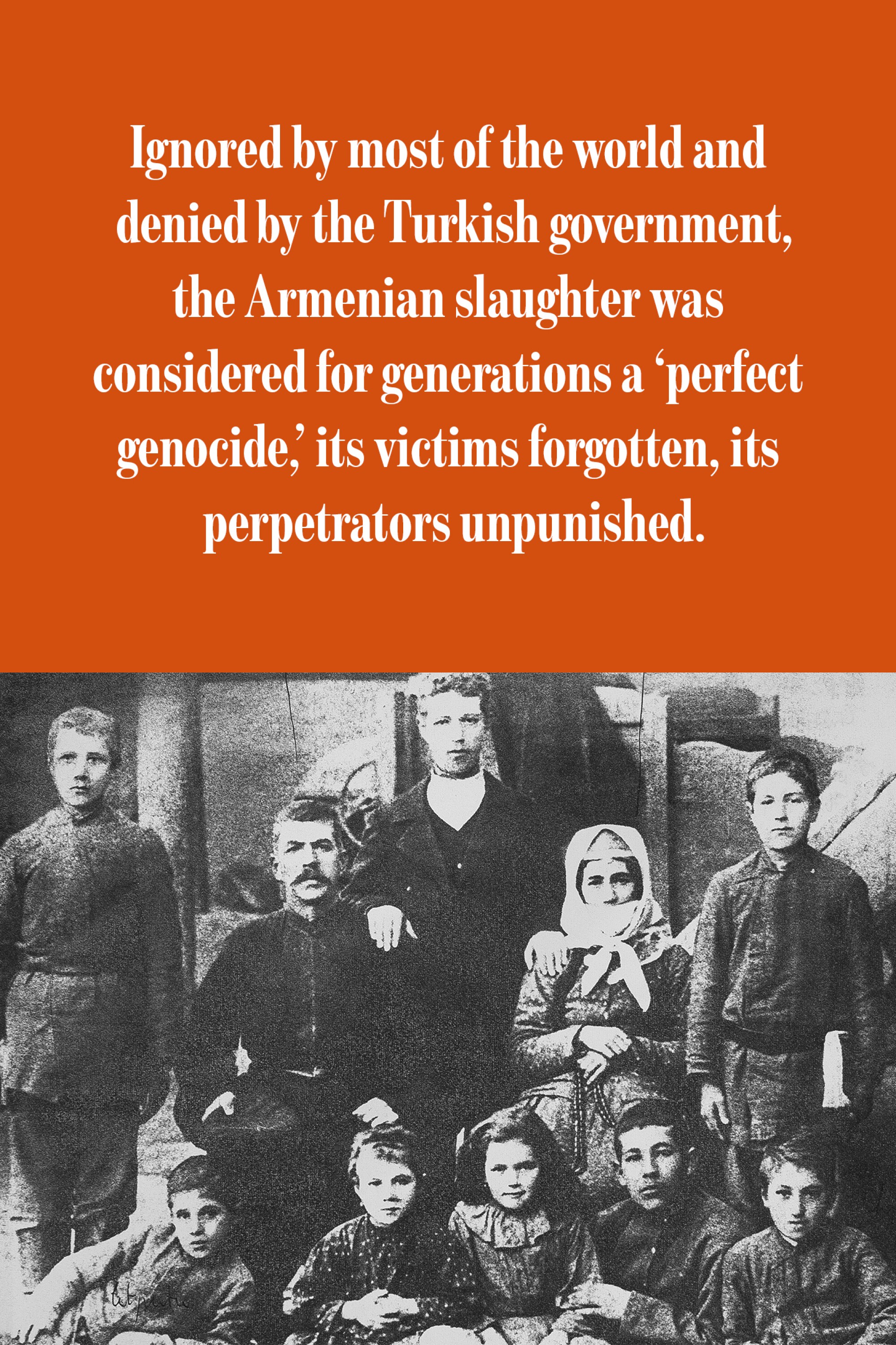 Family portrait of 10 people posing for a photo.