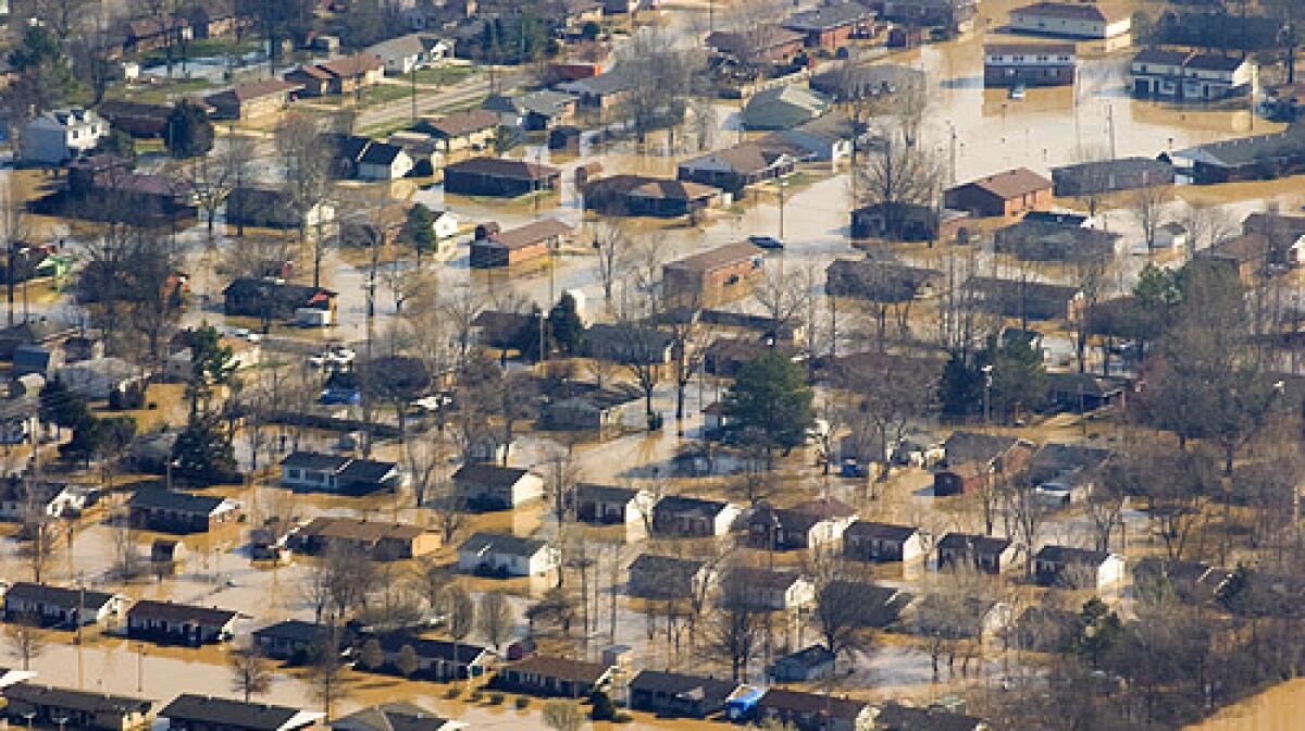 A neighborhood in the south portion of Poplar Bluff, Mo., sits under water even as flood waters from the nearby Black River were slowly receding. Several areas in Missouri were bracing for record-level flood surges expected to hit Friday and Saturday.